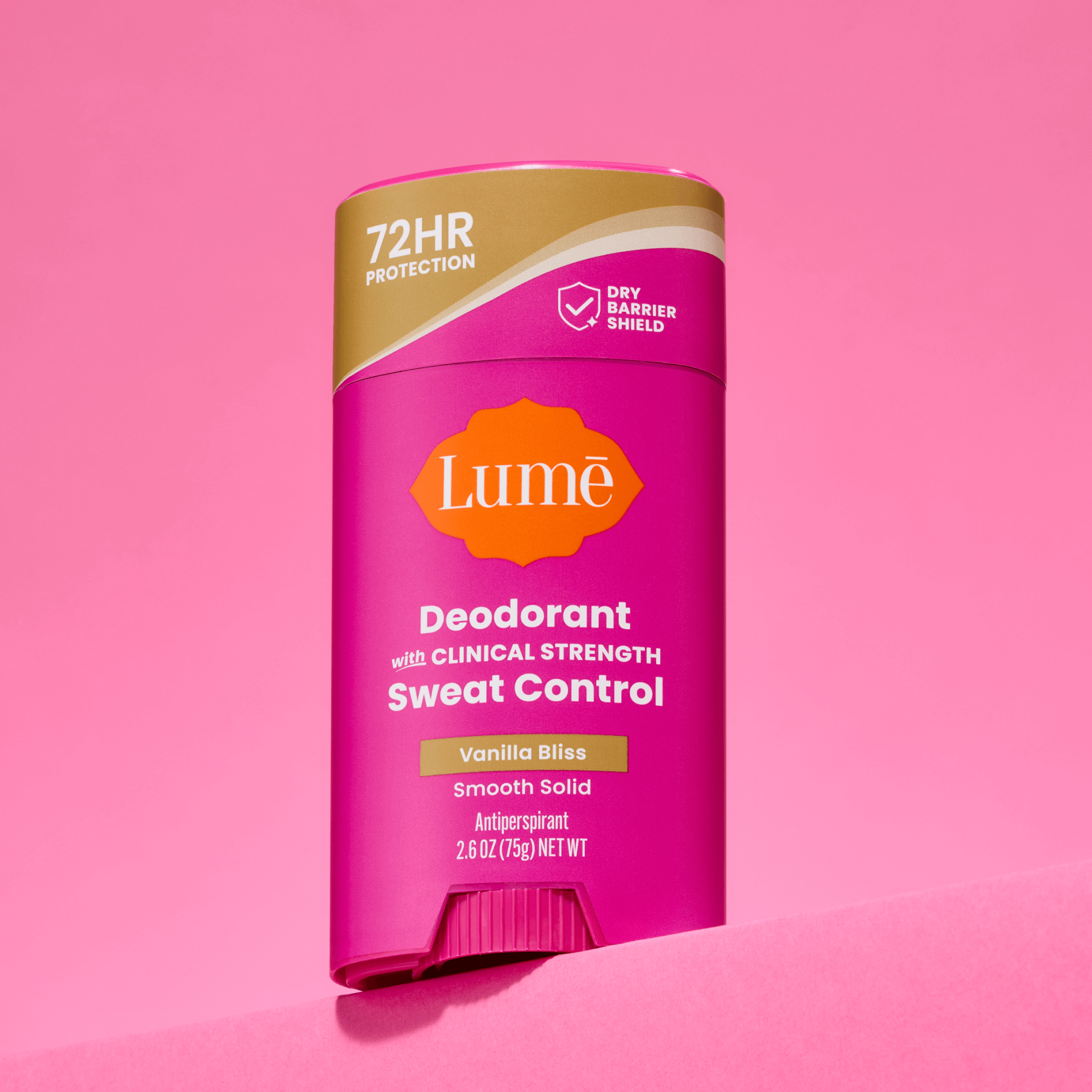 Stick of Lume sweat control deodorant against a pink background