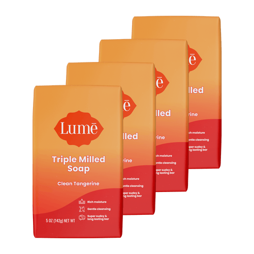 Four overlapping bars of soap in the scent Clean Tangerine